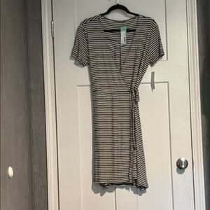 Loveappella Black and White Flutter Sleeve Wrap Mini Dress